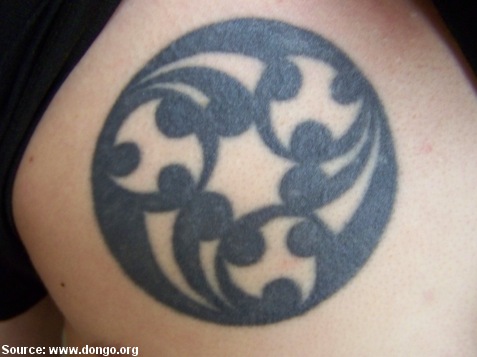 a Kenyan henna tattoo on a woman's hands and a Belgian Tattoo on a man's 